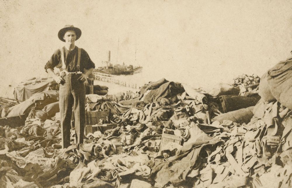 A soldier standing at the supply dump at North Beach, prior to the fire on the 18 December 1915. 